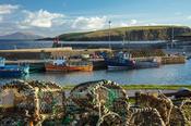 Fishing Boats and lobster pots at Purteen Harbour, Achill Island, County Mayo, Ireland.