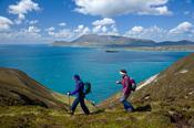 Walkers on the Menawn Cliffs, Achill Island, Co Mayo, Ireland.