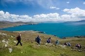 Walkers descending from the Menawn Cliffs, Achill Island, Co Mayo, Ireland.