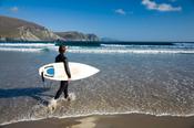 Surfer on Trawmore, Achill Island, Co Mayo, Ireland. image