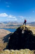 Walker on the south ridge of Mweelrea, Co Mayo, Ireland.