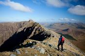 Walking on the ridge to Ben Lugmore, Mweelrea, Co Mayo, Ireland.