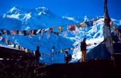 Trekkers beneath Annapurna 2, Annapurna Circuit, Nepal.
