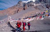 Trekkers at the top of Thorung La (5415m), Annapurna Circuit, Nepal.