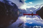Sea kayaking in Hall Arm, Doubtful Sound, Fiordland National Park, South Island, New Zealand.