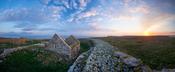 Sunset over the monastic settlement and cashel, Inishmurray Island, County Sligo, Ireland. image