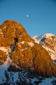 Evening moonrise over Piz Trovat, Berniner Alps, Graubunden, Switzerland.