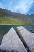 Split rock on the shore of Coumshingaun Lough, Comeragh Mountains, County Waterford, Ireland.
