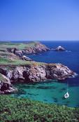 Yacht off the shore of the Saltee Islands, Co Wexford, Ireland. image