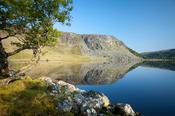The cliffs of Luggala reflected in Lough Tay, Wicklow Mountains, County Wicklow, Ireland.