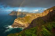 Rainbow over the north Mayo sea cliffs, County Mayo, Ireland.