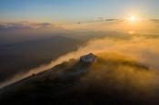 Sunset on the summit of Croagh Patrick, County Mayo, Ireland.