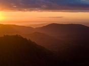 Sunset over the Valdavian rainforest of Puyuhue National Park, Chile.