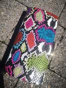 Rihanna Multicolored snake skin clutch