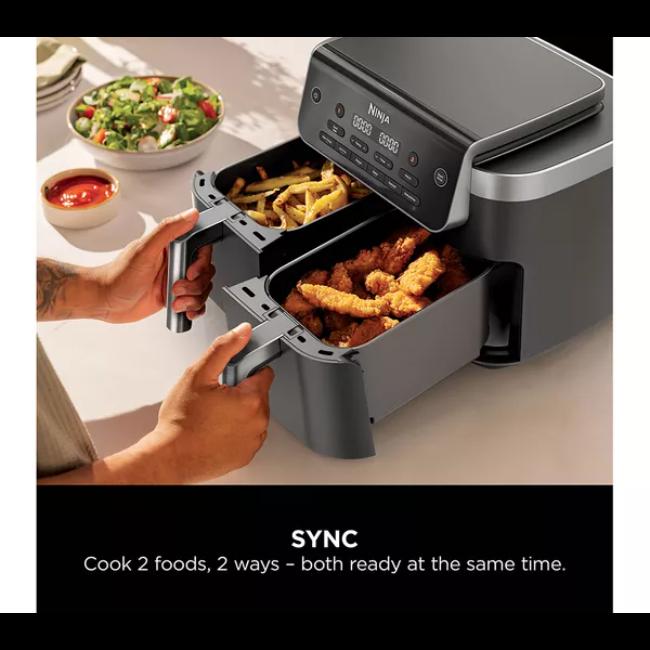 Ninja DualZone 7.6L 2-Drawer Air Fryer Black with 6 Cooking Functions - Max Crisp, Air Fry, Roast, Bake, Reheat, Dehydrate. Features Dual Drawers, Digital Display, Control Panel, Silver Handles.