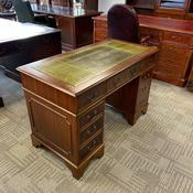Mahogany olive green leather top twin pedestal writing desk
