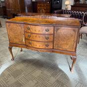 Fabulous burr walnut serpentine sideboard raised on cabriole legs, key included