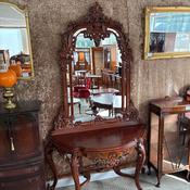 Rococo Revival mahogany console table with matching decorative carved mirror image