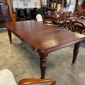 Victorian-style mahogany extendable dining table with turned legs image