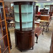 Mahogany bow-front display cabinet with curved glazed top front image