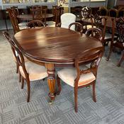 Victorian-style extending dining table with 6 balloon back chairs image