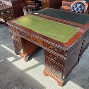 Mahogany flamed green leather top twin pedestal writing desk image