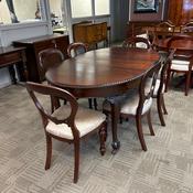 Superb antique mahogany extending dining table complete with six elegant chairs image