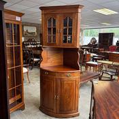 Bespoke walnut inlaid bow fronted double corner unit