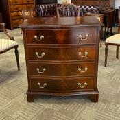 Fabulous serpentine mahogany flamed chest of four drawers