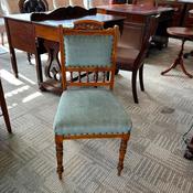 Classic regency-style mahogany occasional chair with green velvet fabric image