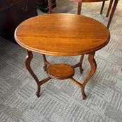 Oval shaped oak antique occasional side table image