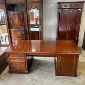 Traditional executive pedestal writing desk with a glass top