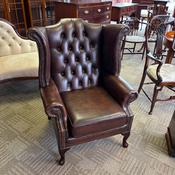 Preowned Queen Anne high back brown leather Chesterfield arm chair