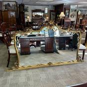 A magnificent large decorative overmantel mirror