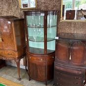 Mahogany bow-front display cabinet with curved glazed top front image