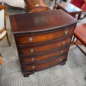 Serpentine mahogany chest of four drawers image