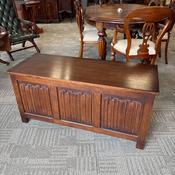 Oak carved linen fold blanket storage box,  panels to front &amp; lift up top