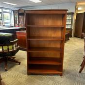 A beautiful mahogany open bookcase with four adjustable shelves
