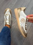 CARMELA gold and off white leather trainers image