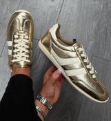 Tommy bowe gold trainers