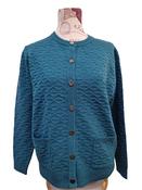 Castle of Ireland | Lumbar cardigan with pockets | Petrol | image