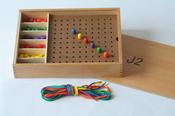 wooden pegs and board