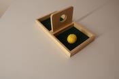 Imbucare board with knit ball