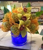 Cymbidium Orchid &amp; Pin Cushion Protea Arrangements image