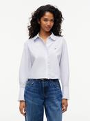 Tommy Jeans DW0DW23457 TJW Ruffle Femme Shirt • Pauls of Kilkenny image