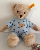 Steiff Baby Bear in blue pyjama image