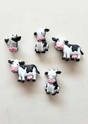 "Moove It!" decorative cow buttons