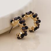 Clara golden cluster hoop earrings in black and gold image