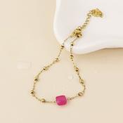 Dotty Stainless Steel Gold Plated Bead Station and Pink Stone Bracelet