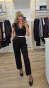 Black Trousers with White Waistband and Black Beading down Leg Seam